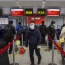 Beijing cancels nearly 70% of commercial flights amid new outbreak