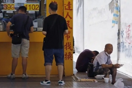Hong Kong drops restaurant dining ban after people forced to eat in streets