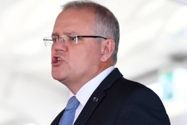 Australia PM walks back 