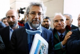 Turkey sentences exiled journalist Dundar to 27 years jail