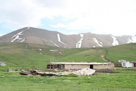 Azeri troops slaughter Armenian villager's cow after stealing it