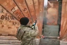 Azeri soldier filmed shooting at Armenian khachkar in Karabakh