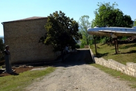 Azeris destroy World War II Armenian hero's bust, vandalize his jet