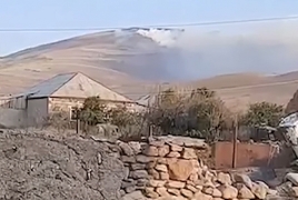 Azerbaijanis setting fire to hayfields belonging to Armenian villagers