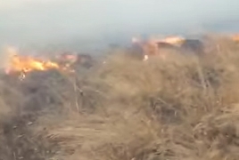 Azerbaijanis set fire to road connecting Armenian villages