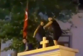 Turkey trying 3 people for dancing on gate of Armenian church