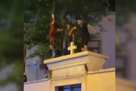 Turkish court acquits 3 who danced atop Armenian church gate