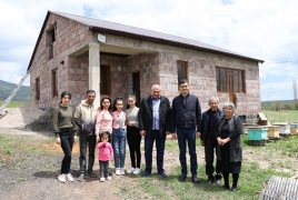Zovaber family leaves earthen walls for newly built stone house