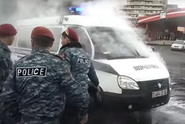 Yerevan: Police car catches fire during opposition protest