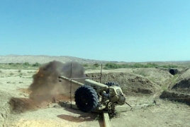 Azerbaijan's artillery units conducting live-fire exercises