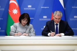 Azerbaijani, Russia parliaments sign agreement on cooperation