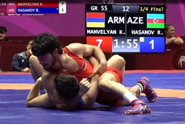 Azeri wrestler loses to Armenian rival, hits him, gets himself disqualified