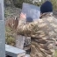 Video shows Azerbaijanis destroying another Armenian cemetery