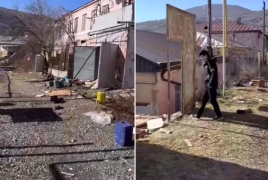 Reports say Azerbaijani students loot Armenian homes in Stepanakert