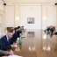 EU commissioner pledges support for peace process