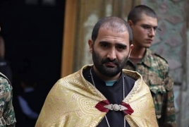 Priest Hunanyan says church ignores its Christian mission