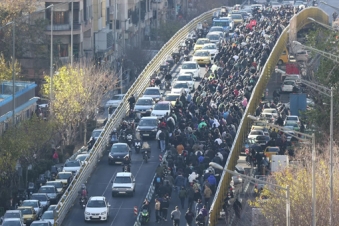 Protests continue in Iran, Tehran bazaar partly shut
