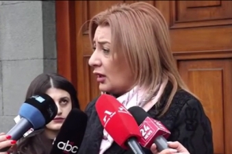 Health workers protest over delayed, lower pay