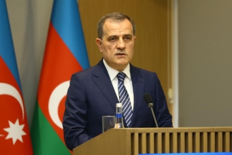 Azerbaijan links treaty to unresolved questions