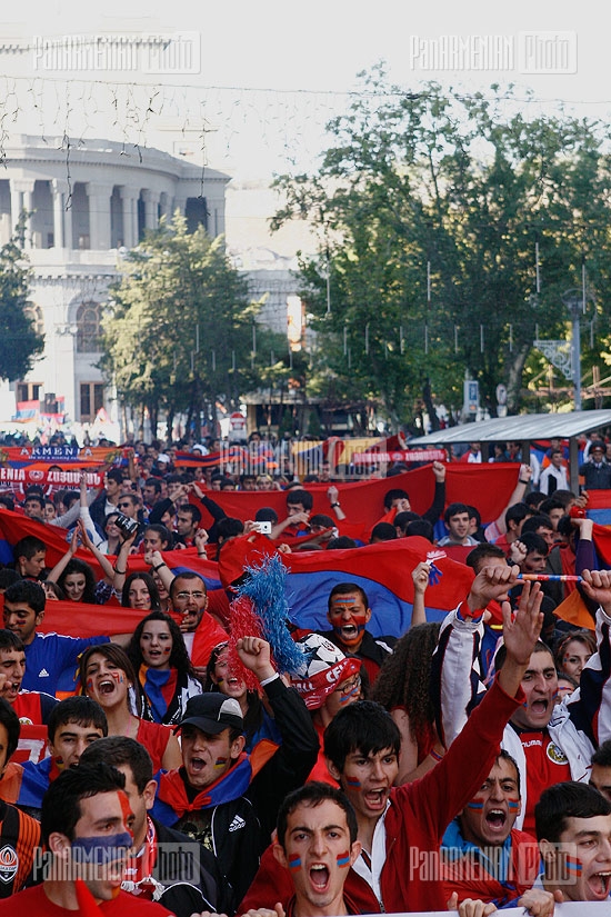 Armenian football fans march to the stadium