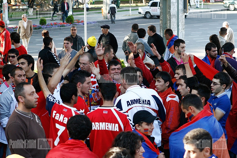 Armenian football fans march to the stadium