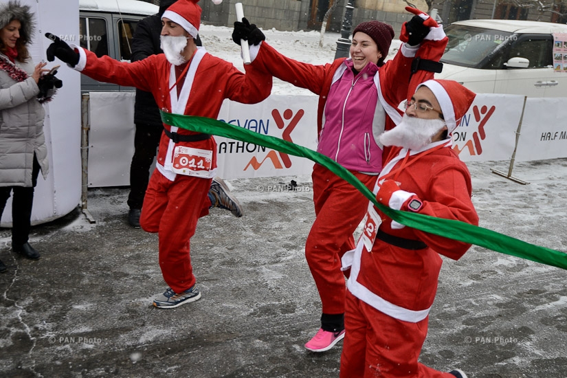 Charity and fun run in Santa costumes