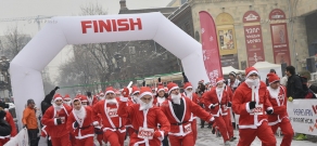 Charity and fun run in Santa costumes