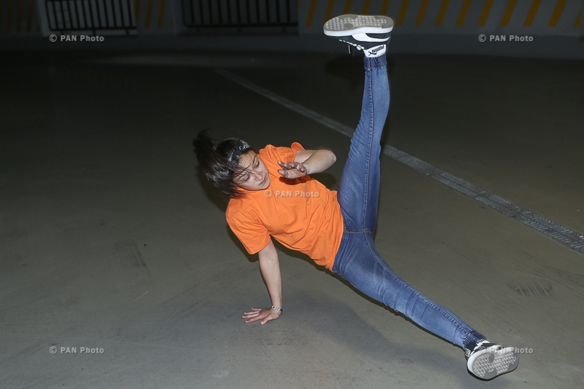 Young Armenian Bboys and Bgirls dancing at an underground parking garage in Yerevan