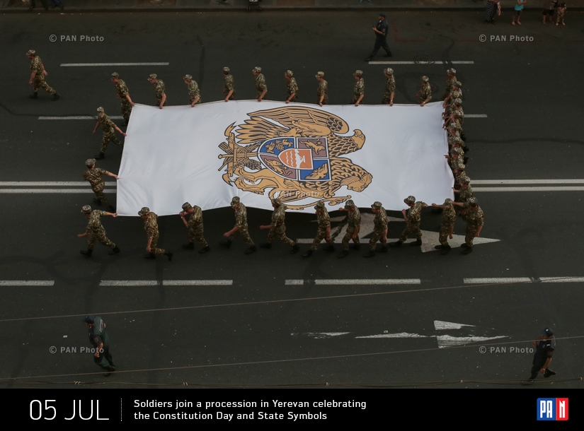 Soldiers join a procession in Yerevan celebrating the Constitution Day and State Symbols 