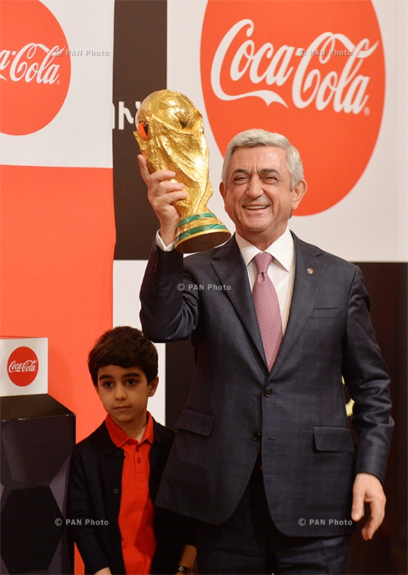 Armenian president Serzh Sargsyan accepting the FIFA World Cup™ Trophy