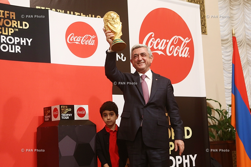 Armenian president Serzh Sargsyan accepting the FIFA World Cup™ Trophy
