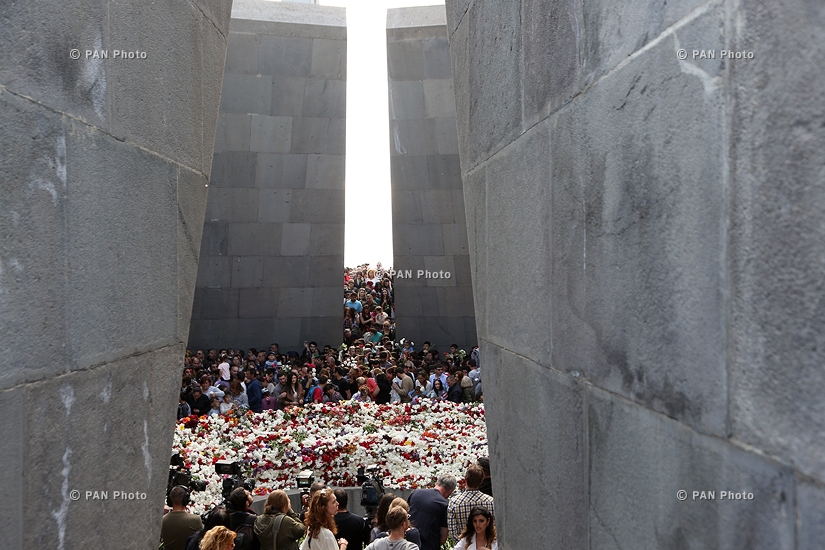 Opposition leader Nikol Pashinyan leads a silent crowd of people to the Armenian Genocide memorial
