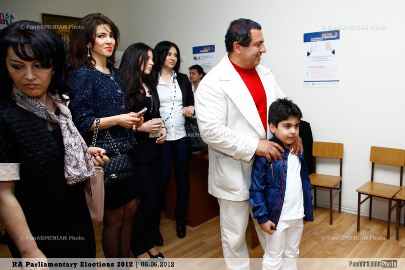 Prosperous Armenia leader Gagik Tsarukyan with his son 