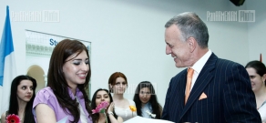 German ambassador to Armenia Hans-Jochen Schmidt awards DAAD scholarship winners with certificates
