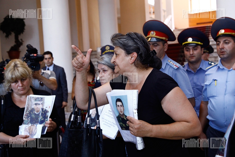 Relatives of dead soldiers hold protest in government building
