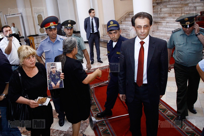 Relatives of dead soldiers hold protest in government building