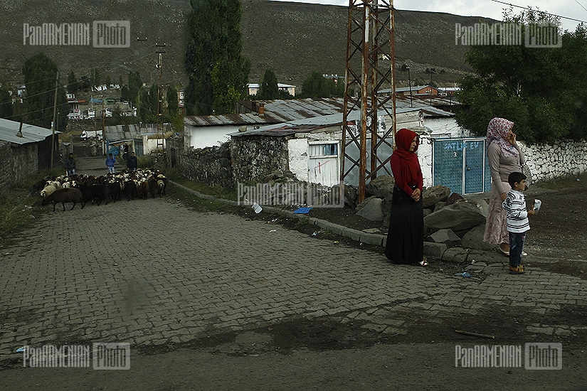 Women waiting for a bus in Kars suburbs