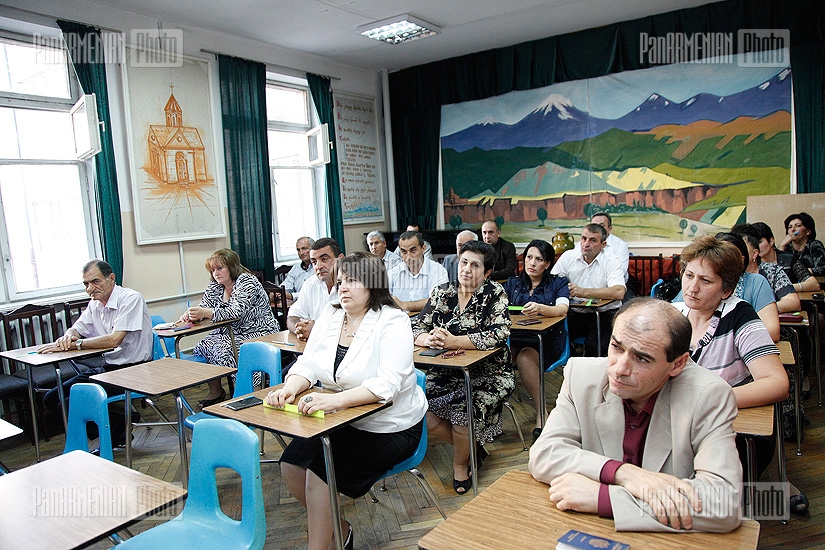 Armenian Education Minister Armen Ashotyan attends the exams for school management contenders