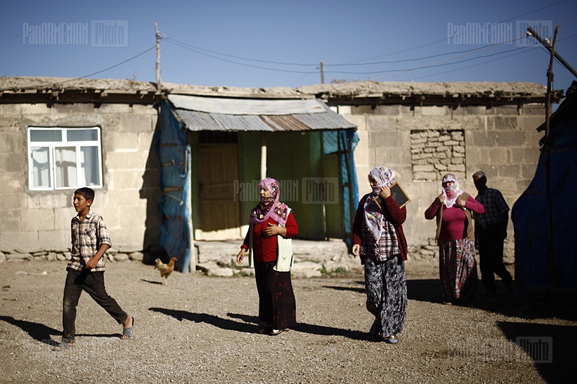 Dwellers of a Kurdish village gather up for a holiday