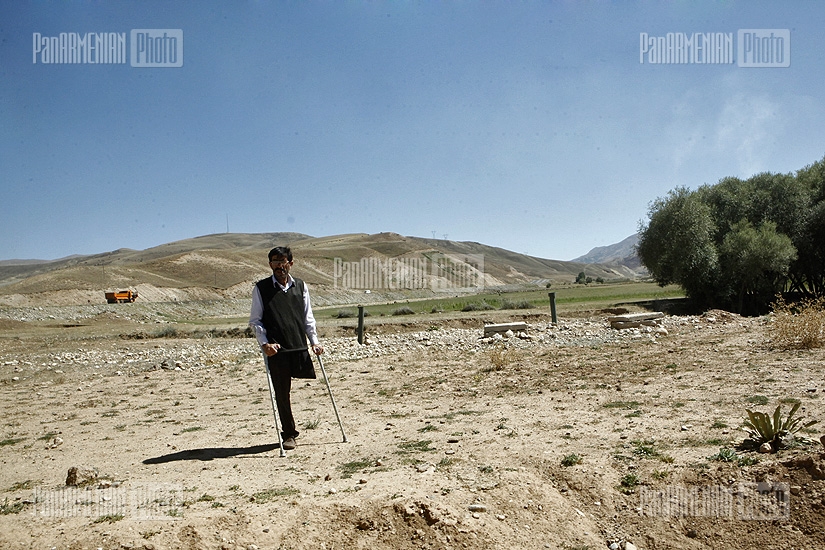 A man with one leg in Mush valley. He earns his living asking for money from people, who have rest near the river and his house on their road to Mush