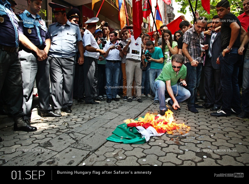 Burning Hungary flag after the extradition of Ramil Safarov to Azerbaijan 