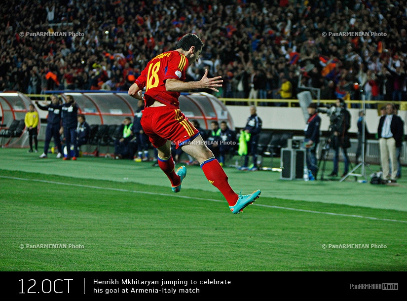 Henrikh Mkhitaryan jumping to celebrate his goal at Armenia-Italy match