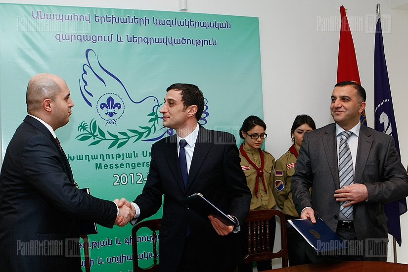 Ceremony of signing of a tripartite agreement aimed at enhancing needy children's social integration