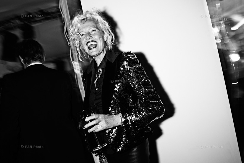 Photographer Ellen von Unwerth having fun with fellow photographers during Martini party dedicated to herself
