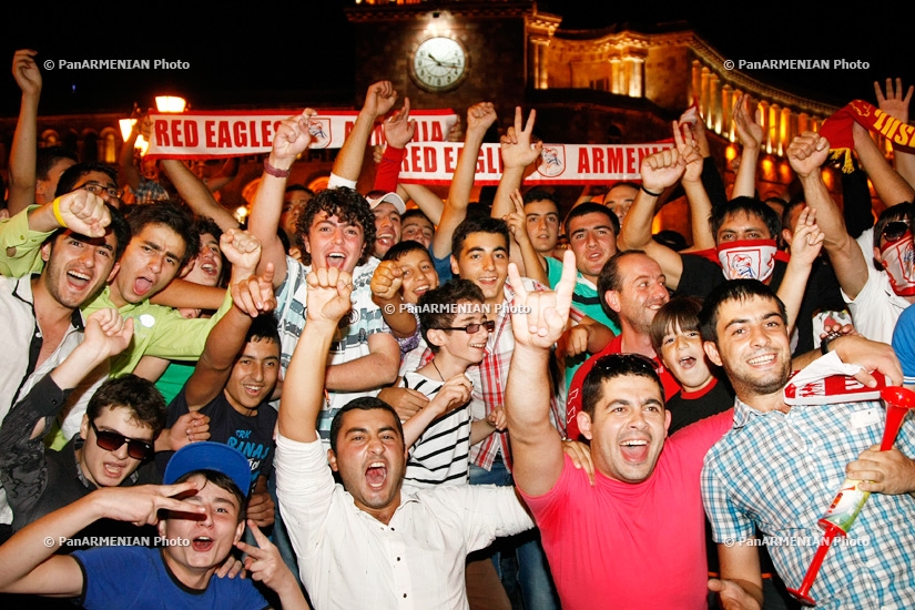Armenian fans celebrate their team's victory over Czech Republic