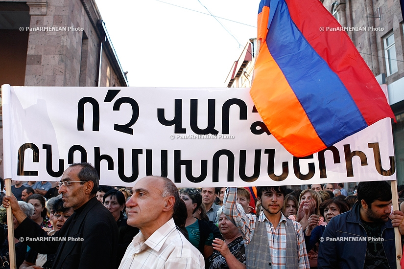  Members of “Let's Liberate the Monument from an Oligarch” civil initiative marched to the Covered Market