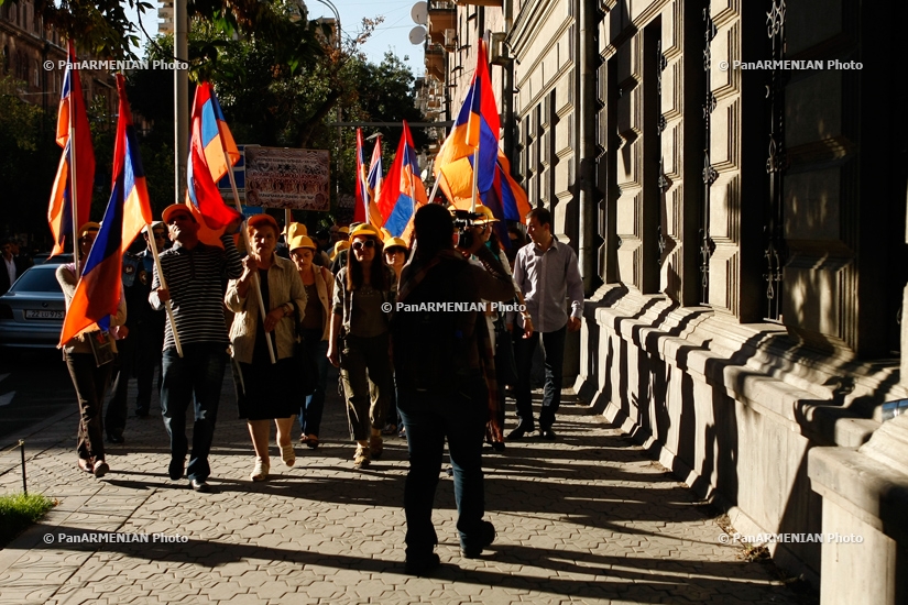  Members of “Let's Liberate the Monument from an Oligarch” civil initiative marched to the Covered Market