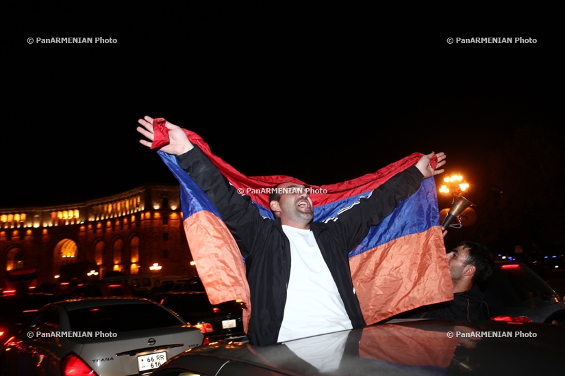 Armenian fans celebrate their team's victory over Bulgaria
