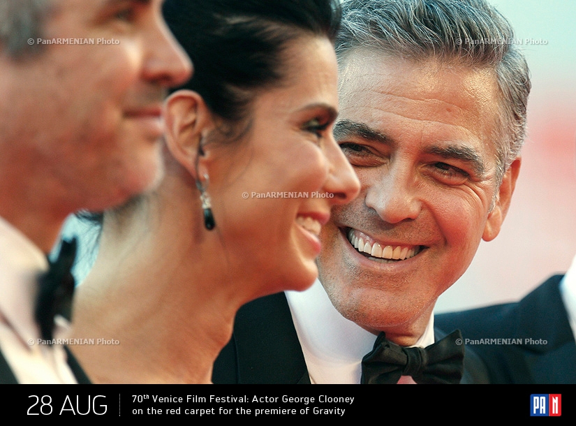 70th Venice Film Festival: Actor George Clooney on the red carpet for the premiere of Gravity
