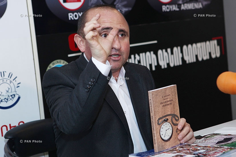 Journalist Tatul Hakobyan presents special edition of Beirut-based Aztag newspaper and Rober Hatechian's books